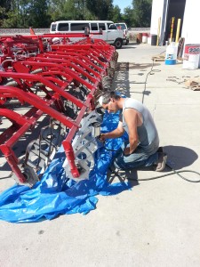 Mitch Buell Painting A Rolling Basket For A  Happy Customer